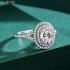 Oval Moissanite diamond Halo Pave Ring Shown in 9x11mm 5.0ct 